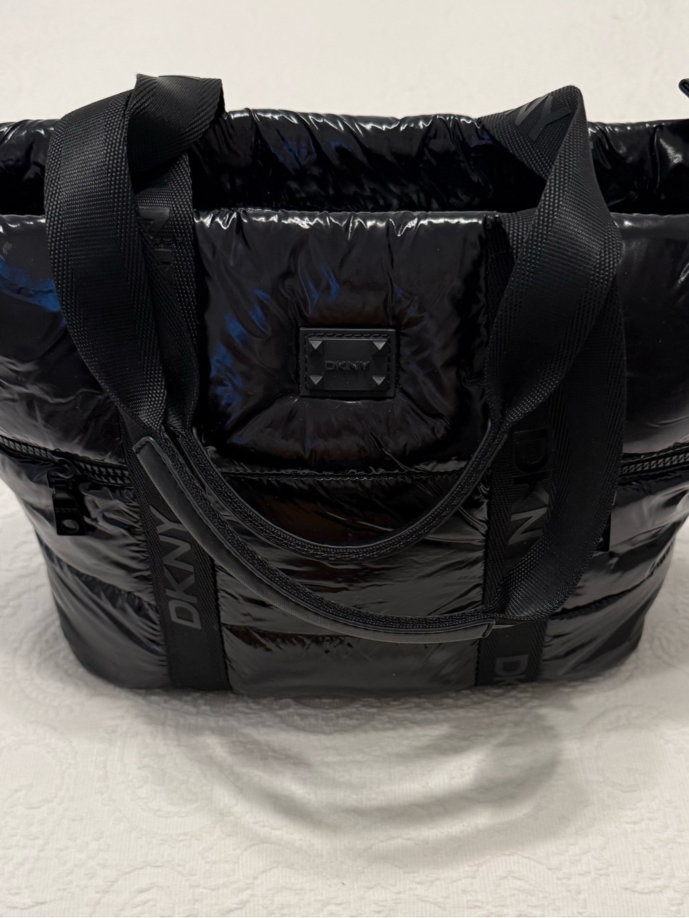 DKNY Glossy Black Quilted Tote with Branded Webbing